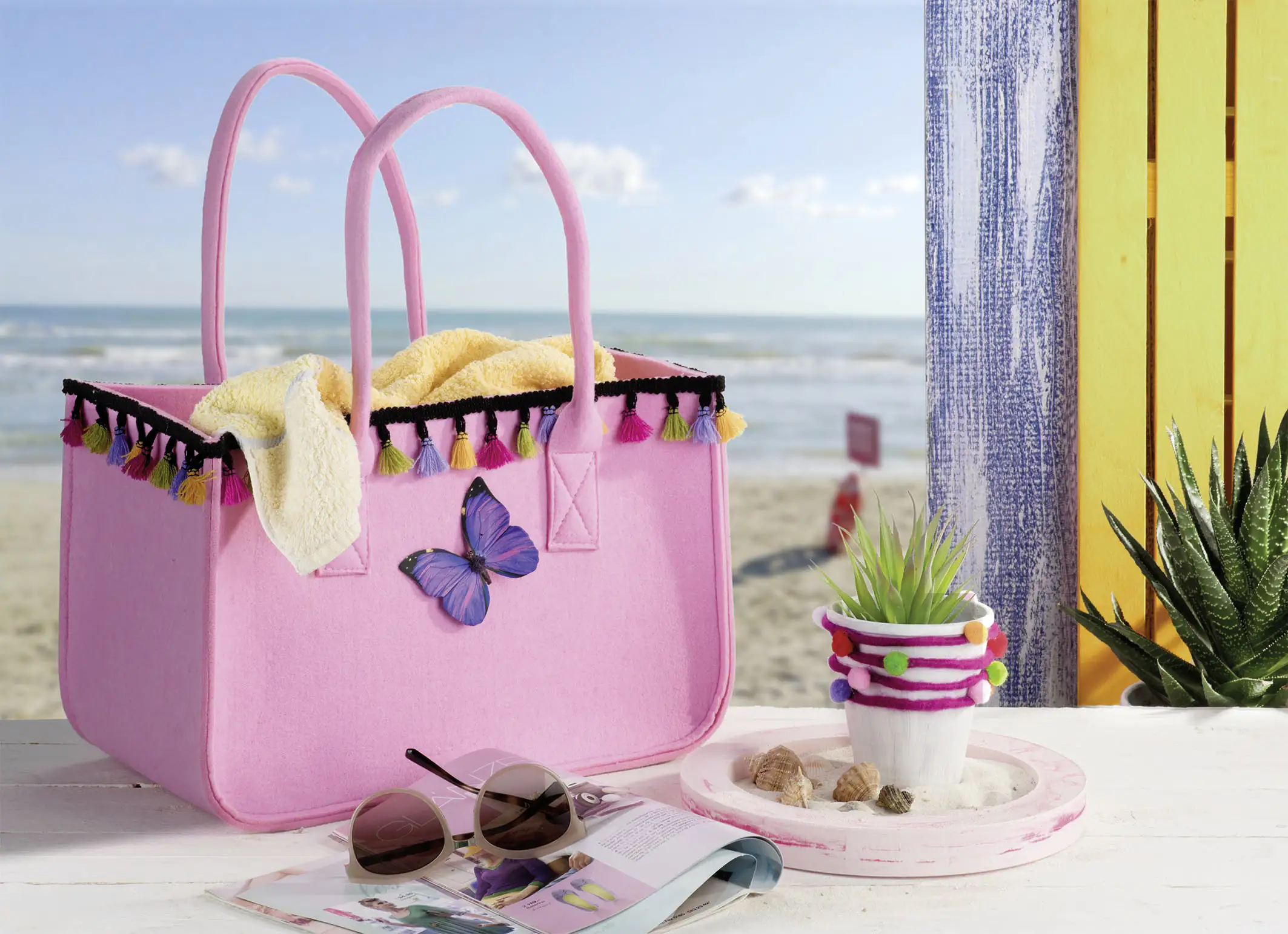 Glorex Quasten Girlande bunt 1 m schwarzes Band