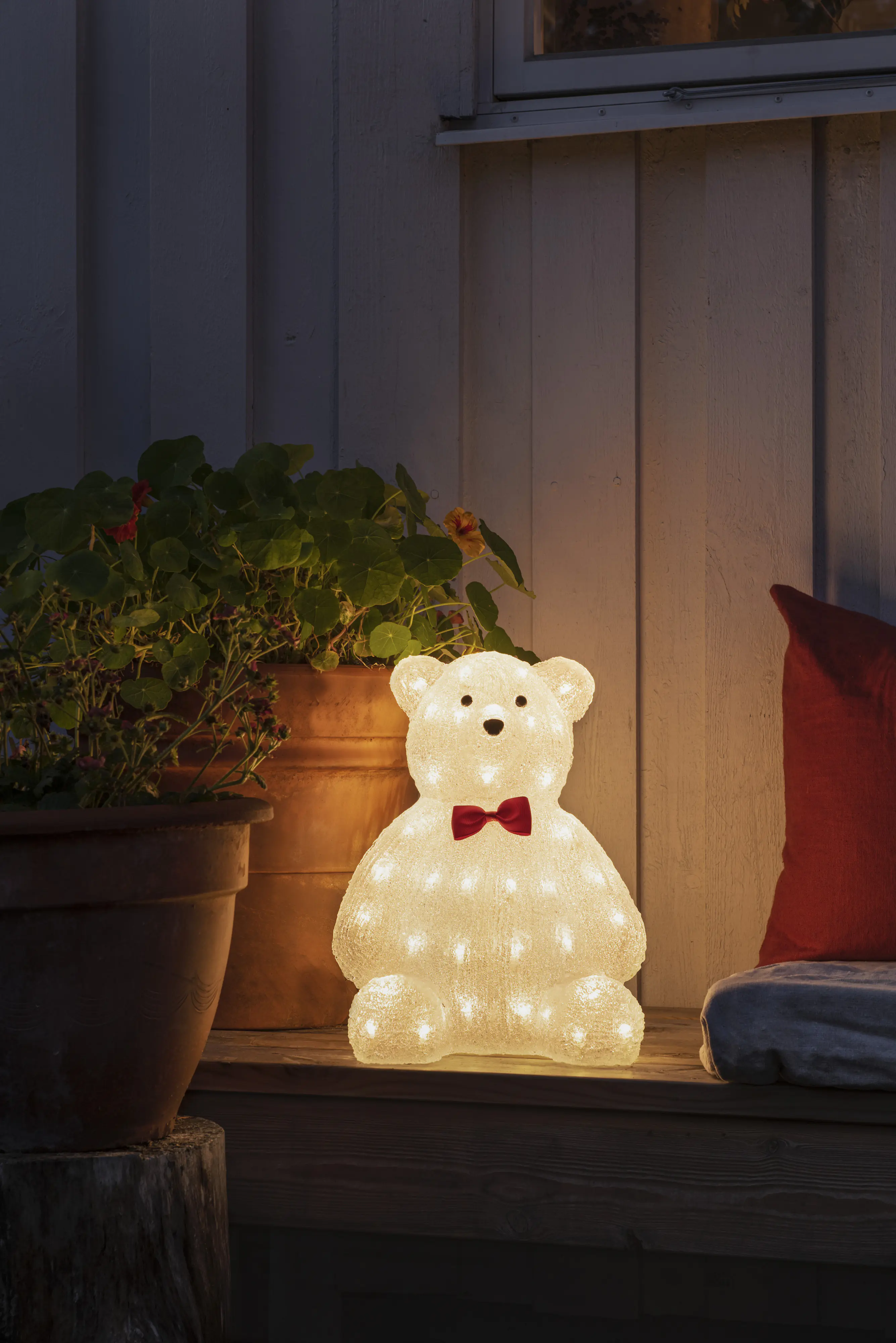 Konstsmide LED Acryl Teddybär Außen 64 warmweiße Dioden