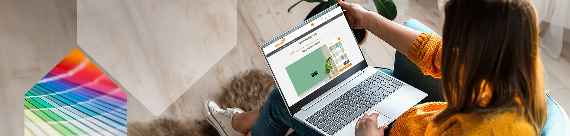 Laptop mit Farbmischkonfigurator von Globus Baumarkt.