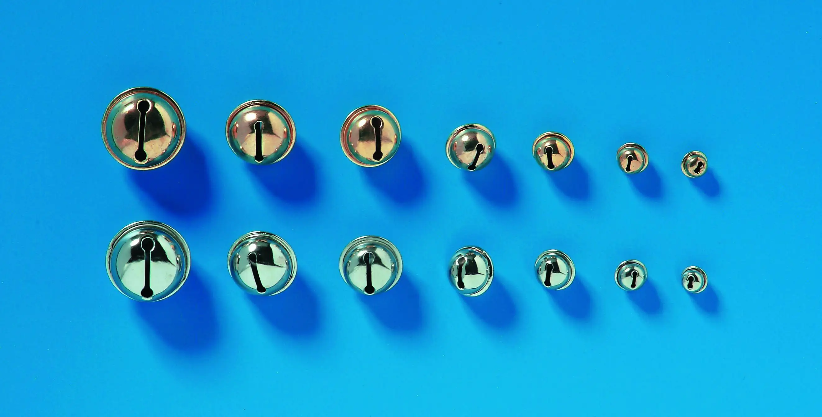 Glorex Rollenglöckchen 15 mm silberfarben, 8 Stück