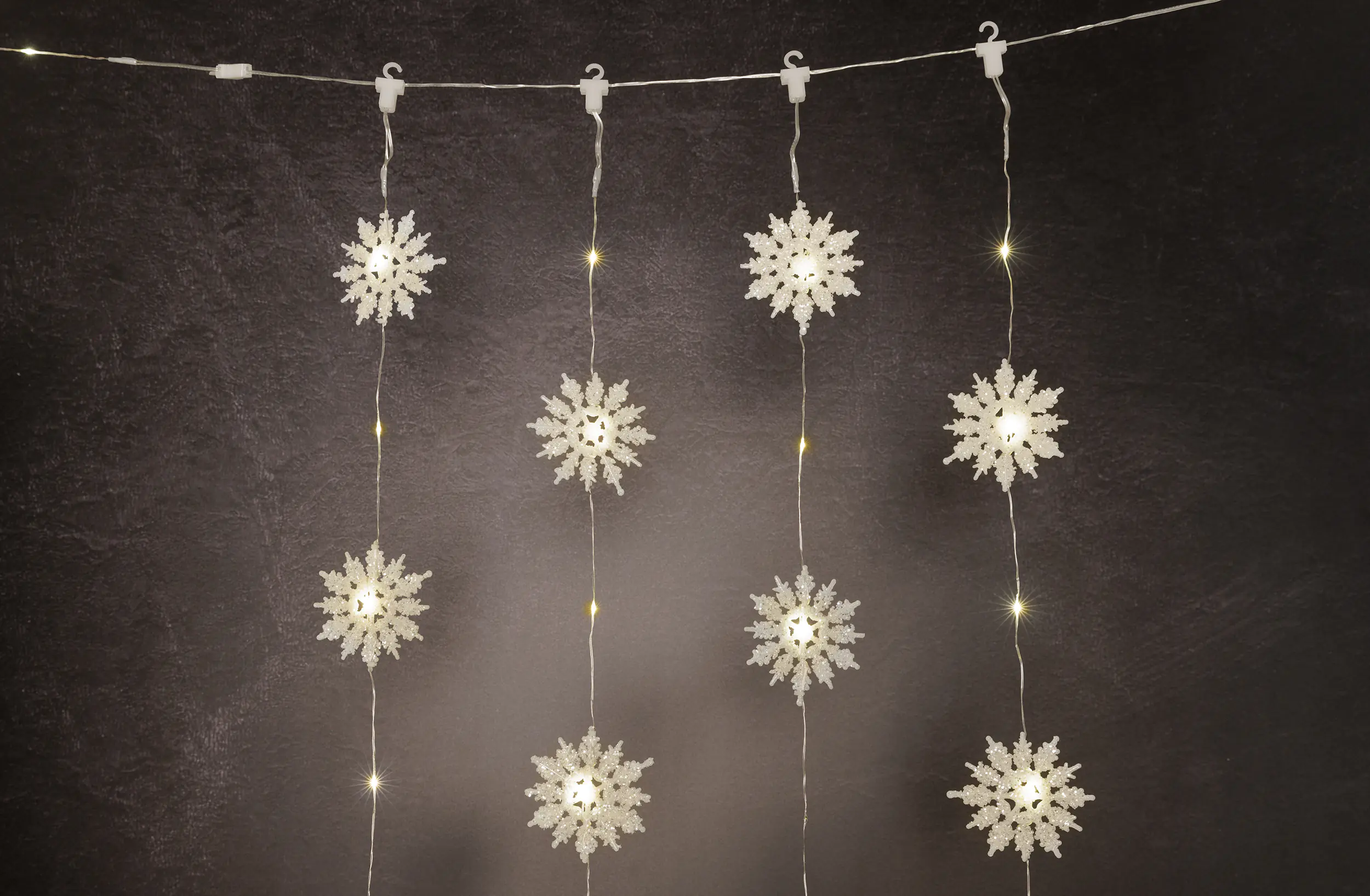 TrendLine LED-Lichtervorhang Schneeflocken Innen 60 x 150 cm warmweiß mit Timer TrendLine LED-Lichtervorhang Schneeflocken Innen 60 x 150 cm warmweiß mit Timer
