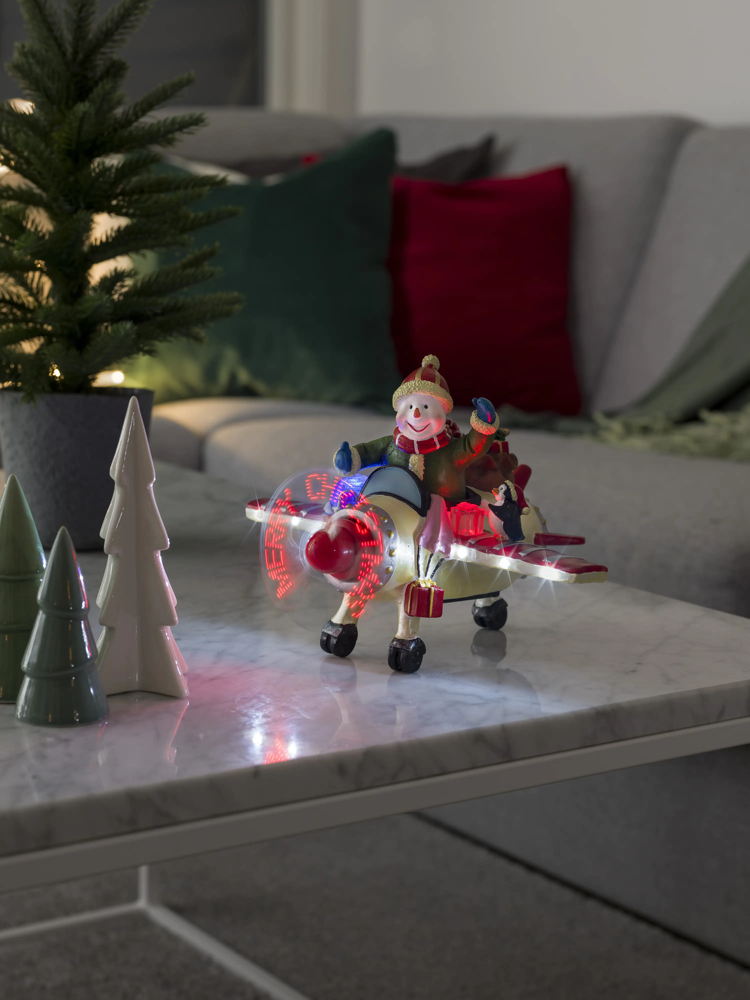 Konstsmide LED Szenerie Schneemann im Flugzeug mit Animation Konstsmide LED Szenerie Schneemann im Flugzeug mit Animation