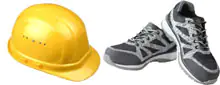 Gelber Schutzhelm und ein Paar graue Sicherheitsschuhe mit weißen Sohlen und Schnürsenkeln auf weißem Hintergrund.
